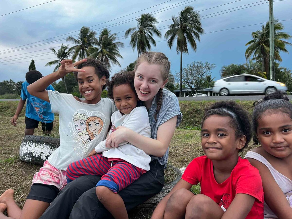 vollie sitting with kids-3 VolunteerForever